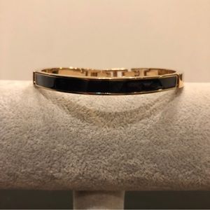 Anne Klein Bracelet,  gold tone w/ navy blue enamel, foldover clasp, extra link
